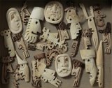 Collection of carved heads and faces - Details