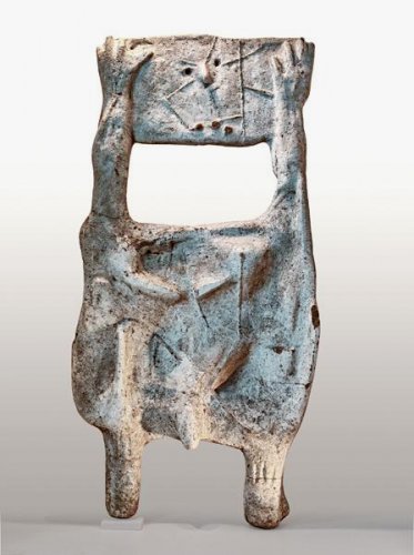 Standing Figure Holding Head - Details